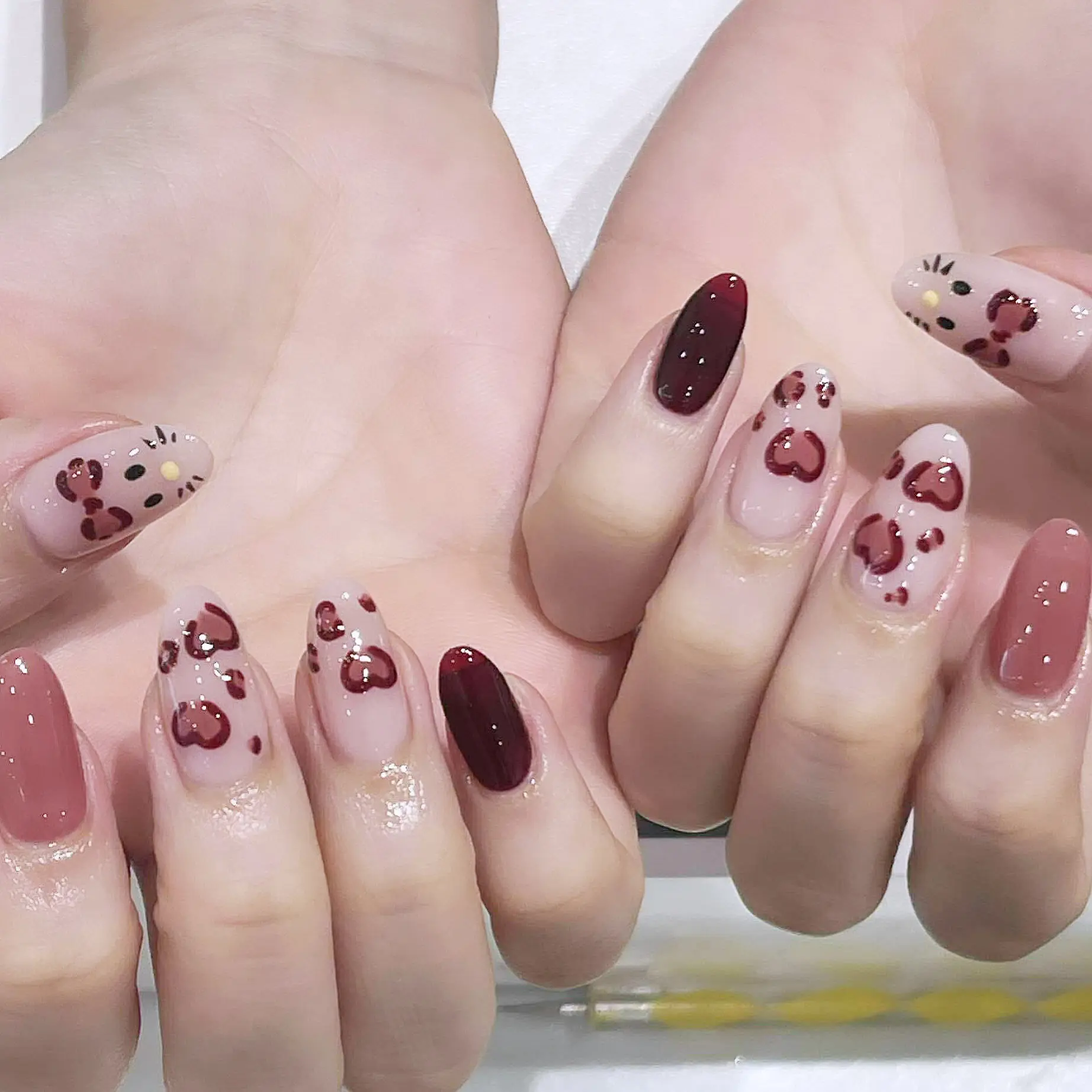 Leopard nâu đỏ + đỏ vang nail art